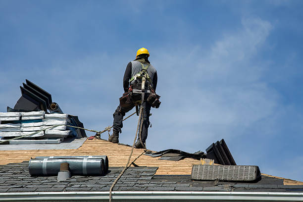 Professional Roofing technician working in South Lee, MA